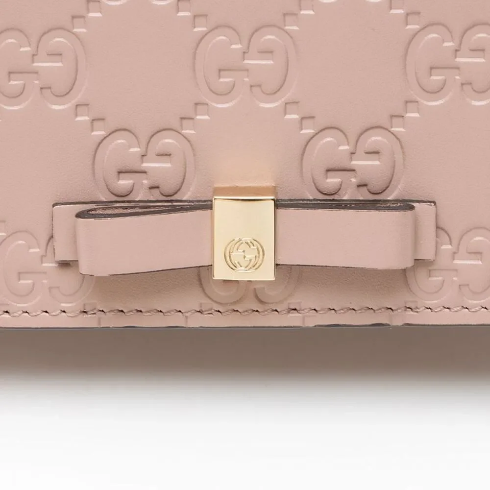 Gucci Guccissima Leather Signature Bow Mini Wallet on Chain